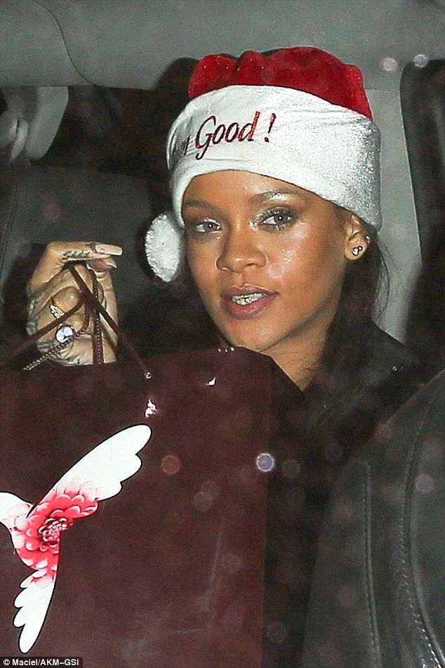 3b87528000000578-4050578-on_the_nice_list_rihanna_was_spotted_out_at_celebrity_hot_spot_t-a-28_1482214864131