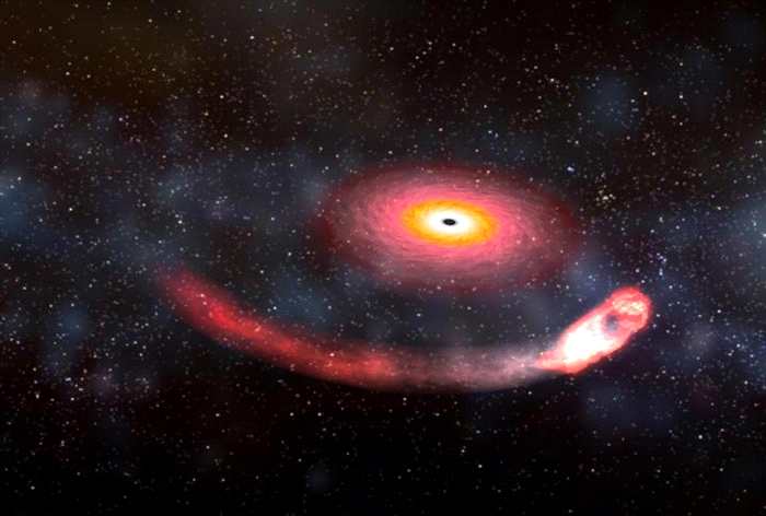 这张艺术家的想象图描绘出黑洞吞噬中子星的情景。 中子星绕着黑洞旋转，黑洞巨大的重力将中子星撕成碎片，这种现象称为「潮汐力崩解」（tidal disruption