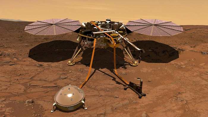 这张插图绘制了安放在火星表面的洞察号登陆器。 登陆器磁力计所获得的初步数据显示，这颗红色星球的磁场会在夜晚以无法解释的方式摇摆。 ILLUSTRATION BY