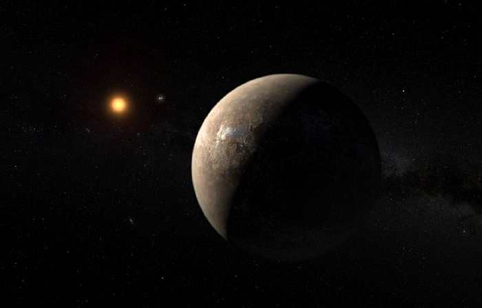 图为可能宜居的系外行星比邻星b，围绕红矮星比邻星旋转。