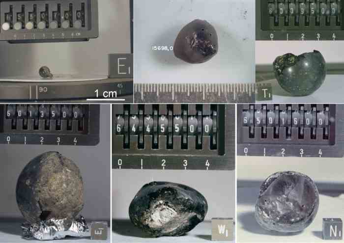阿波罗15号和16号宇航员在月球上采集到的玻璃珠，它们都是黑色和不透明的，其中可见大量的碎屑，部分玻璃珠内部中空。样品编号见图中所示 (图片来源 Lunar a