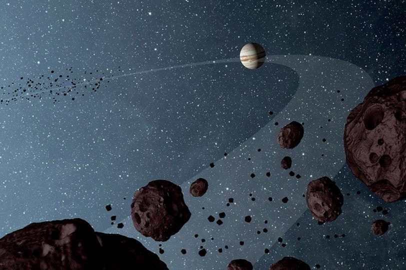 科学家为围绕木星的两个巨大小行星群的谜团提供新解释