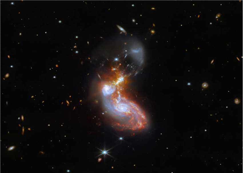 詹姆斯-韦伯太空望远镜捕捉到惊人的星系合并II ZW 96