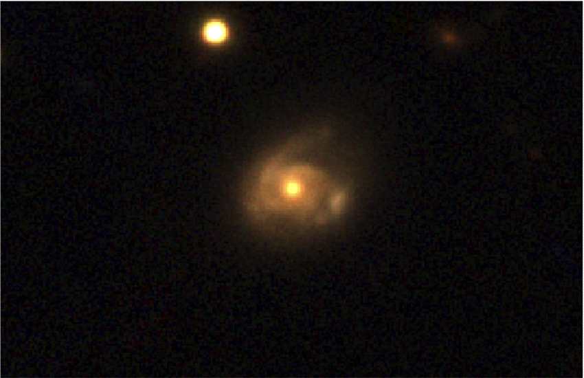 遥远星系中发现一个黑洞正在反复蚕食一颗类似太阳的恒星