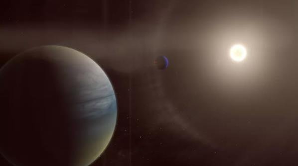 艺术家对围绕明亮恒星 HD 152843 轨道运行的两颗气态行星的描绘.jpg
