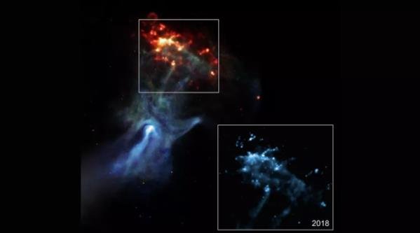 美国宇航局的钱德拉 X 射线天文台捕捉到了这张巨大的手形特征图像.jpg