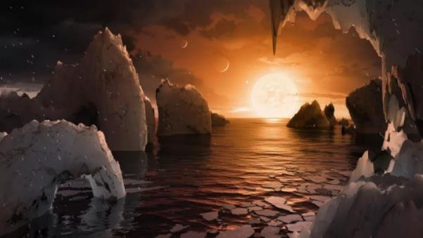 TRAPPIST-1 系统中行星表面的艺术家插图，该系统包含七个大致地球大小的世界.jpg