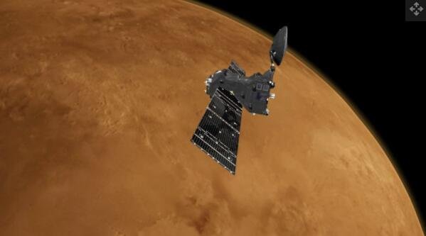 一位艺术家描绘的微量气体轨道飞行器在火星周围工作.jpg