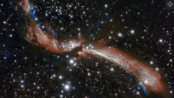 智利双子座南望远镜拍摄到年轻的恒星发出柔和弯曲的恒星喷流.jpg