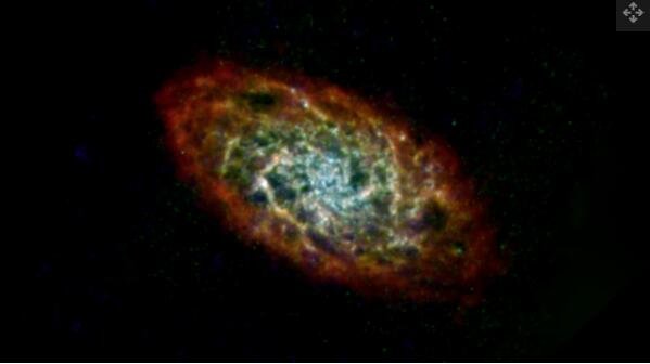 三角星系或 M33 在这里以远红外和无线电波长的光显示.jpg