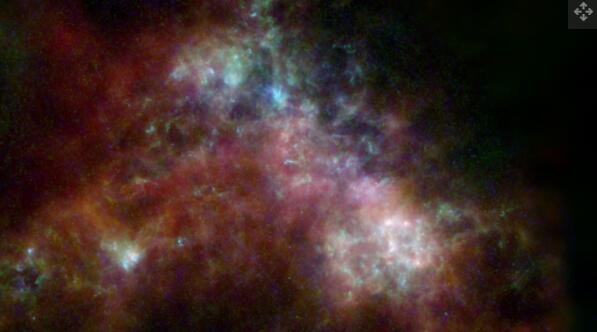 赫歇尔任务在其他三台退役太空望远镜的帮助下看到了与银河系相邻的小麦哲伦星云.jpg