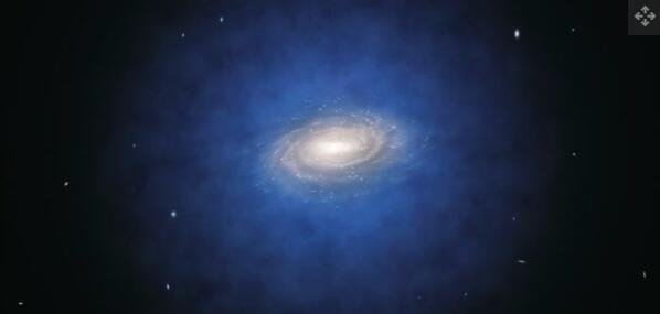 一幅插图显示了一个被代表暗物质晕的蓝色云团包围的星系.jpg