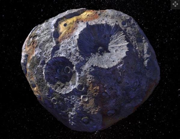 一位艺术家的概念描绘了 140 英里宽（226 公里宽）的小行星 Psyche，它位于火星和木星之间的主要小行星带.jpg